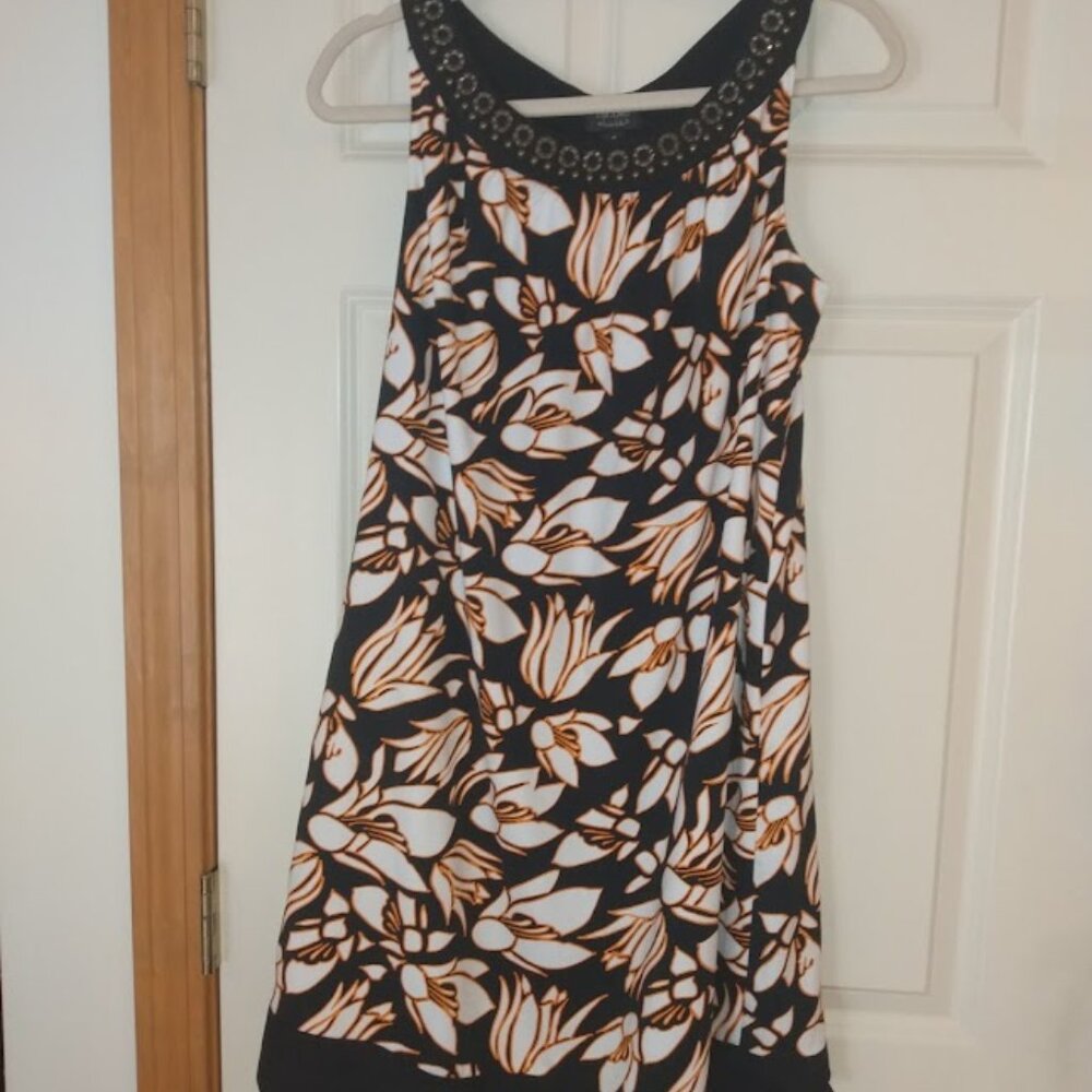 Nichol, by Nicole Miller: Flower design dress with metal accents at neckline.